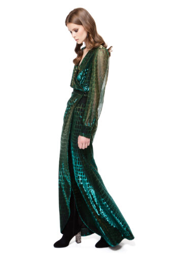 EMILIA wrap maxi dress in green and gold chameleon with long sheer sleeves, draped top and snap fasteners by DIANA ARNO.