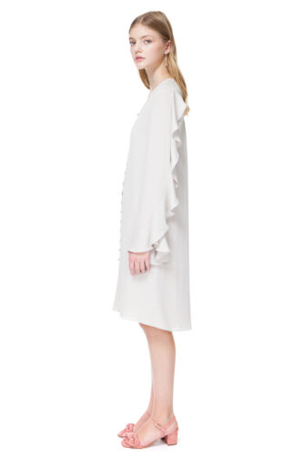 FLO long sleeve midi dress with frills in pleasing ivory nude.